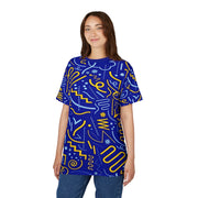 Woman wearing a blue t-shirt with yellow abstract patterns on a white background