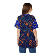 Woman wearing a blue t-shirt with colorful abstract patterns on a white background