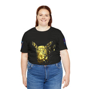 Person wearing a black t-shirt with a gold graphic design on a white background
