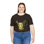 Person wearing a black t-shirt with a gold graphic design on a white background