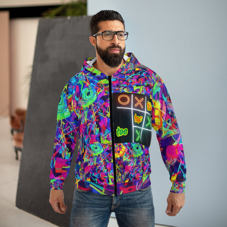 Man wearing a colorful hoodie with abstract patterns and text.